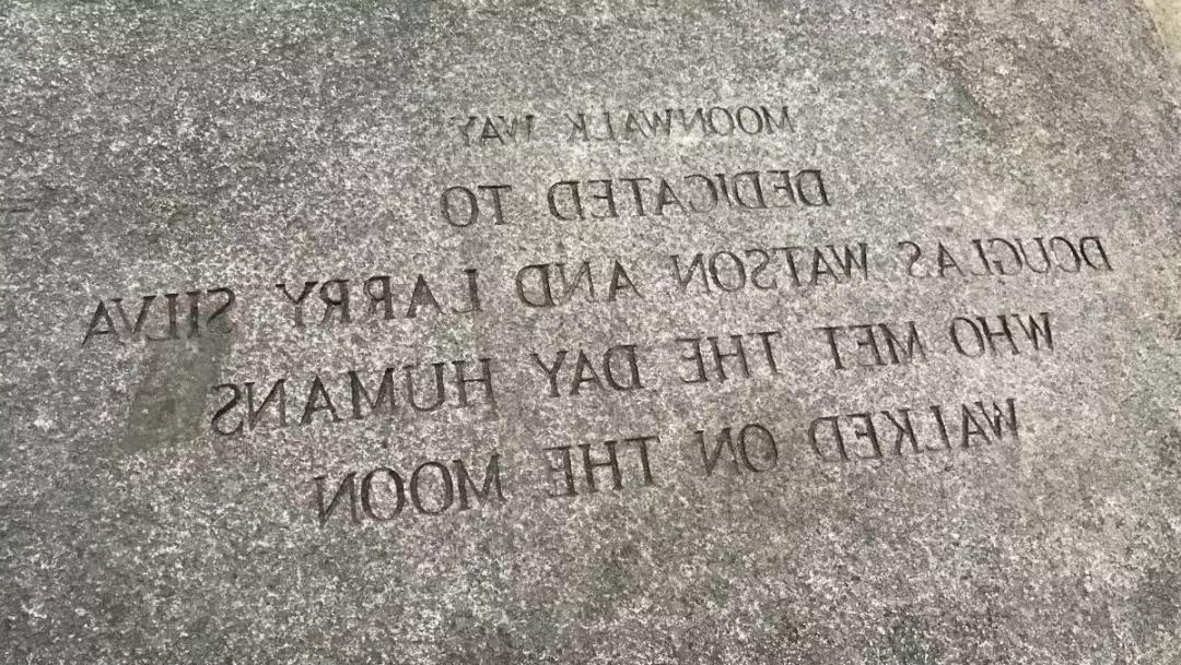 An engraved rock at the National AIDS Memorial Grove in San Francisco